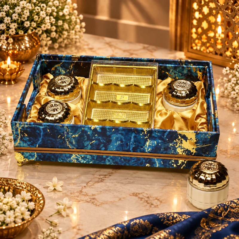 Blue marble-finish tray with gold-lid jars and gold inserts